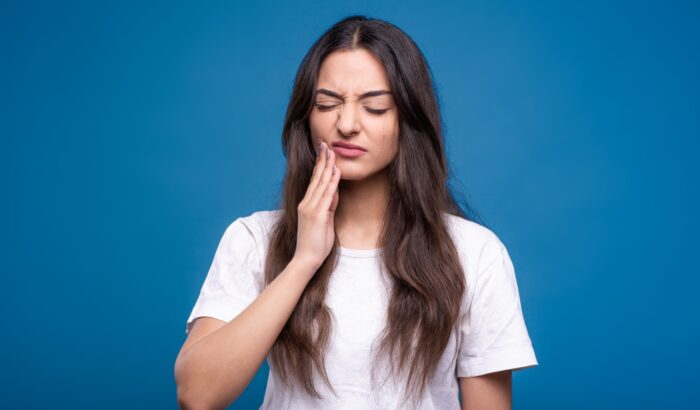 Why does my tooth filling still hurt after a month of my treatment